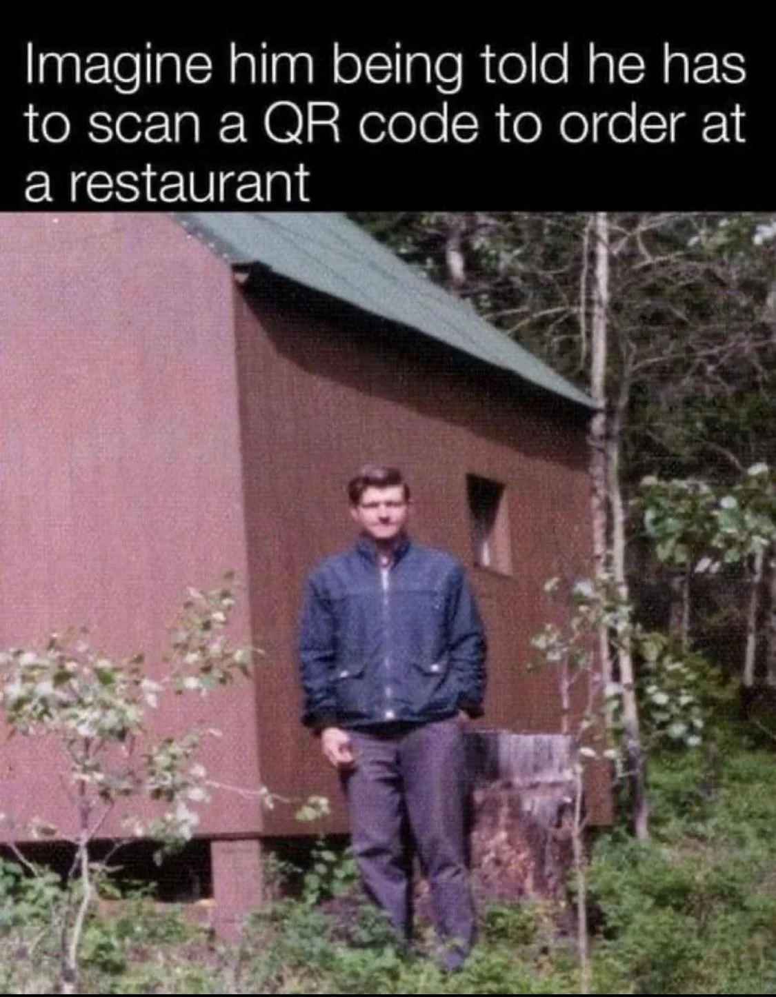 ted kaczynski in front of his shed. it's captioned with &quot;imagine him being told he has to scan a QR code to order at a restaurant&quot;